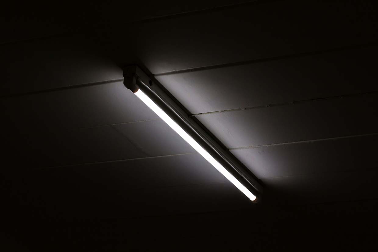 image of a overhead lighting unit where light blocking tape would be used