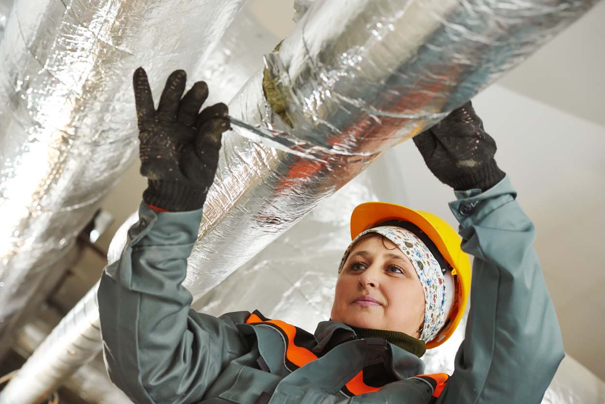 image showing foil tape being applied to insulated pipework