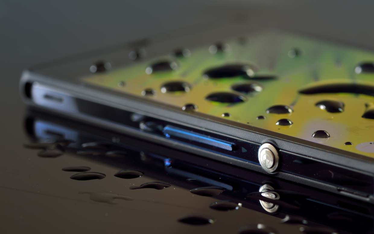 image of mobile phone with water on its surface typical of a sheilding application